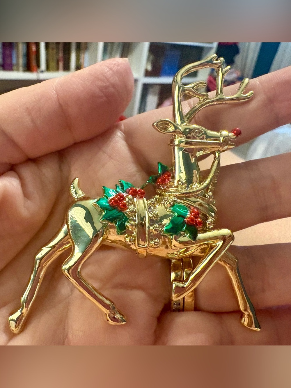 Gold-tone reindeer lapel pin